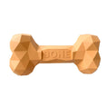 Charger l'image dans la visionneuse de la galerie, Tan geometric rubber dog bone toy with BONE logo on white background