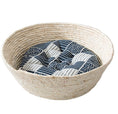 Load image into Gallery viewer, Rattan cat bed with blue and white tufted cushion isolated on white background