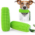 Load image into Gallery viewer, Green corn-shaped chew toy with rope and dog with the toy in mouth