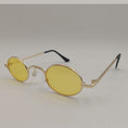 Charger l'image dans la visionneuse de la galerie, Yellow oval dog sunglasses toy on white background with black ear tips