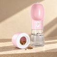 Load image into Gallery viewer, Pink pet water bottle with its detachable food compartment and dry food