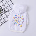 Load image into Gallery viewer, White plush hooded dog sweater with colorful ANTI SOCIAL PUPPY CLUB print laid flat