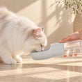 Load image into Gallery viewer, White cat drinking from a grey portable pet water bottle