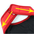 Charger l'image dans la visionneuse de la galerie, Close-up of red insulated dog coat adjustable hook-and-loop strap with yellow arrows