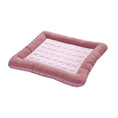 Load image into Gallery viewer, Single pink quilted cooling pet bed mat with striped cushions isolated on white background.