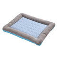 Load image into Gallery viewer, Single blue cooling pet bed mat with gray striped cushions isolated on white background.