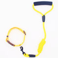 Load image into Gallery viewer, Yellow dog leash and adjustable collar set with foam-padded handle on white background