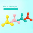 Load image into Gallery viewer, Four dog chew toys in yellow, pink, turquoise, and orange colors arranged in a row