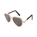 Load image into Gallery viewer, Gold metal frame polarized pet sunglasses with black lenses viewed from the side on white background