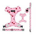 Cargar la imagen en la vista de la galería, Pink cherry patterned dog harness, collar, leash, and poop bag holder displayed together