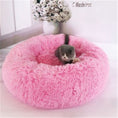 Load image into Gallery viewer, Kitten sitting inside pink round plush pet nest bed against white backdrop