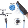 Load image into Gallery viewer, Diagram showing water flow from a faucet through adapters and hose into the silicone pet bathing glove with labeled water outlet and on/off switch