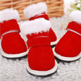 Charger l'image dans la visionneuse de la galerie, Front view of red winter pet boots with white faux fur lining on a soft surface
