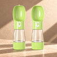 Load image into Gallery viewer, Two green portable pet water bottles with food storage