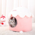 Load image into Gallery viewer, Grey tabby cat inside pink ice cream shaped plush winter cat nest with white fleece top