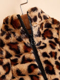 Load image into Gallery viewer, Close-up view of the zipper and soft fuzzy acrylic leopard print fabric on the dog jacket