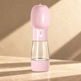 Load image into Gallery viewer, Pink portable pet water bottle with food storage
