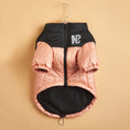 Cargar la imagen en la vista de la galería, Pink and black padded dog jacket on hanger showing front with zipper and logo