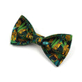 Load image into Gallery viewer, Detailed view of green jungle print bowknot accessory for pet collar