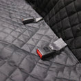 Charger l'image dans la visionneuse de la galerie, Close-up of black quilted water-resistant fabric material of the car pet mat