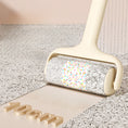 Load image into Gallery viewer, Sticky hair roller removing pet hair and lint from terrazzo surface