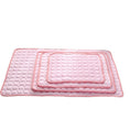 Cargar la imagen en la vista de la galería, Same set of pink pet cooling mats stacked, showing quilted bubble texture and pink binding