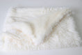 Cargar la imagen en la vista de la galería, Ivory plush pet blanket folded on a white surface showing soft faux fur texture