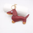 Load image into Gallery viewer, Red faux leather sausage dog keychain displayed on white background