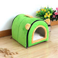 Load image into Gallery viewer, Bright green plush pet kennel with yellow ears on wooden surface