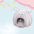 Load image into Gallery viewer, Light gray plush pet nest resembling a bunny with long ears and smiling face set against a soft dreamy background