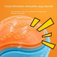 Load image into Gallery viewer, Close-up of textured orange and blue rubber dog ball highlighting clear and moderate sound feature to attract dogs