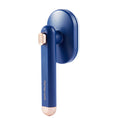 Load image into Gallery viewer, Blue rotating pet hair removal comb with rose gold accents shown on plain white background.