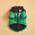 Cargar la imagen en la vista de la galería, Green and black padded dog jacket on hanger showing front with zipper and logo