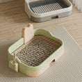 Cargar la imagen en la vista de la galería, Light green and peach dog potty tray with scoop hanging on side, metal grate lifted