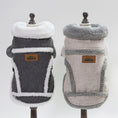 Cargar la imagen en la vista de la galería, Back view of two plush wool blend dog coats on mannequins: one charcoal gray with white trim and one light gray with gray trim