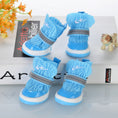 Cargar la imagen en la vista de la galería, Blue knit dog booties with white sole and reflective strap viewed from multiple angles