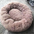 Load image into Gallery viewer, Brownish taupe fluffy round pet bed on a textured surface