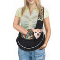 Load image into Gallery viewer, Woman carrying small chihuahua in patterned breathable pet sling carrier with orange and gray design