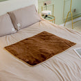 Cargar la imagen en la vista de la galería, Rich brown plush pet blanket spread flat on a beige bed without pet