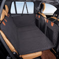Charger l'image dans la visionneuse de la galerie, Black quilted waterproof dog seat cover installed in back seat of car