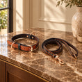 Cargar la imagen en la vista de la galería, tan set with rose-gold hardware on brown marble