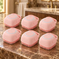 Load image into Gallery viewer, Six pink square silicone pet bath brushes on brown marble