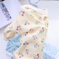 Load image into Gallery viewer, Close-up of yellow floral dog pajamas showing mesh texture and button accents