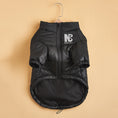 Cargar la imagen en la vista de la galería, Black padded dog jacket on hanger showing front with zipper and elastic cuffs