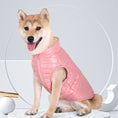 Cargar la imagen en la vista de la galería, Shiba Inu dog wearing a pink padded nylon quilted jacket with zipper closure sitting on a terrazzo surface