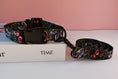 Load image into Gallery viewer, Dark green nylon dog collar and leash with colorful butterfly designs and black hardware on white box