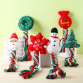 Charger l'image dans la visionneuse de la galerie, Set of six Christmas-themed dog toys with plush holiday shapes and twisted red, white, and green cotton rope
