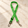 Load image into Gallery viewer, Green adjustable pet car tether with metal seatbelt clip and swivel snap hook
