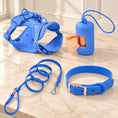 Charger l'image dans la visionneuse de la galerie, Moonlight Blue dog harness, collar, lead and bag holder arranged on beige marble