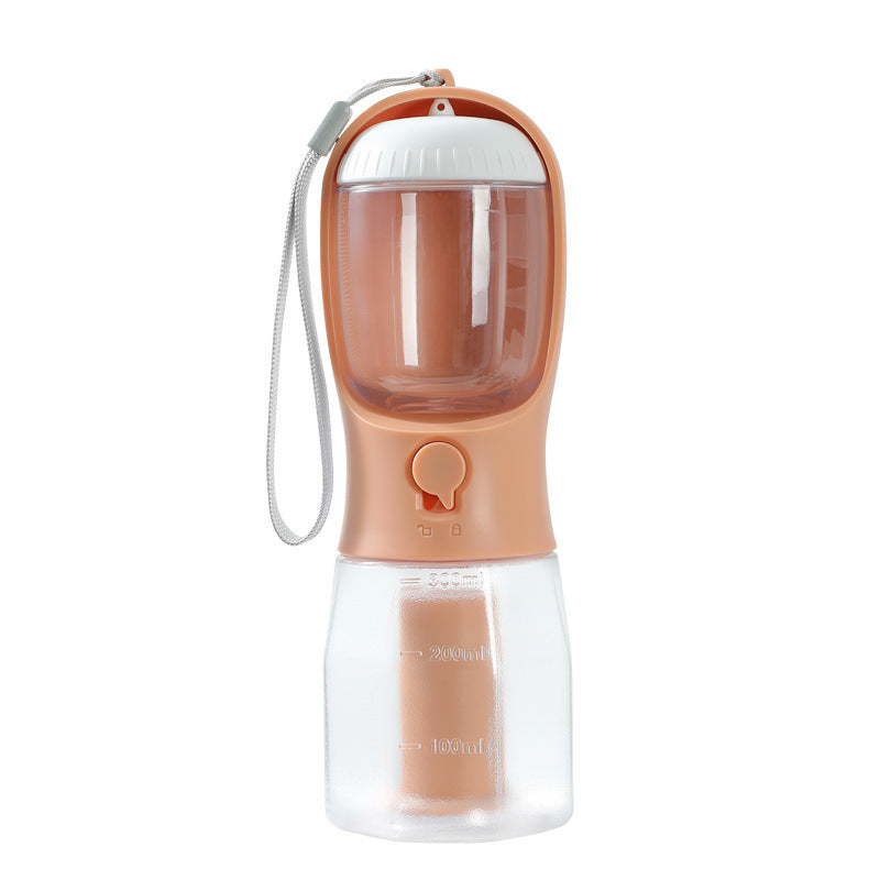 Peach colored portable dog water and food bottle with food hopper and spill-proof water dispenser